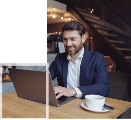 Professional man working on a laptop at a desk, representing reliable HND assignment writing services.