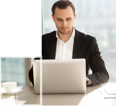 Professional legal writer working on a laptop, providing expert HND business law assignment help for students.